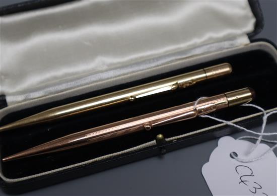 A 9ct gold cased pencil and one other yellow metal case pencil